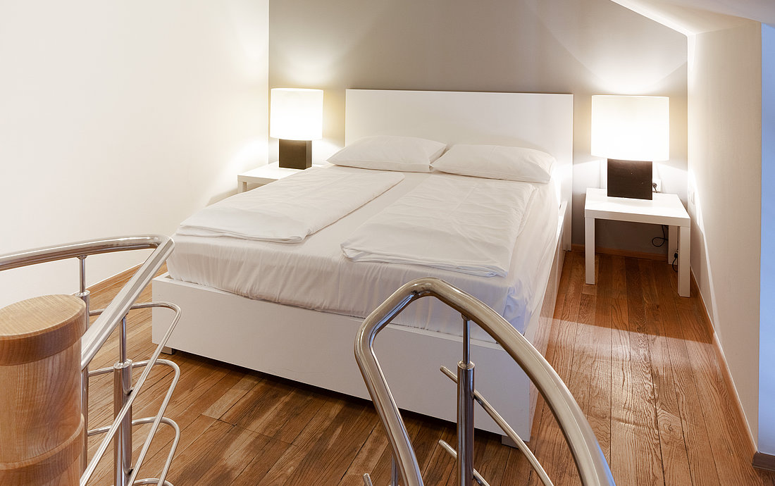 Schlafzimmer im Family Superior Apartment