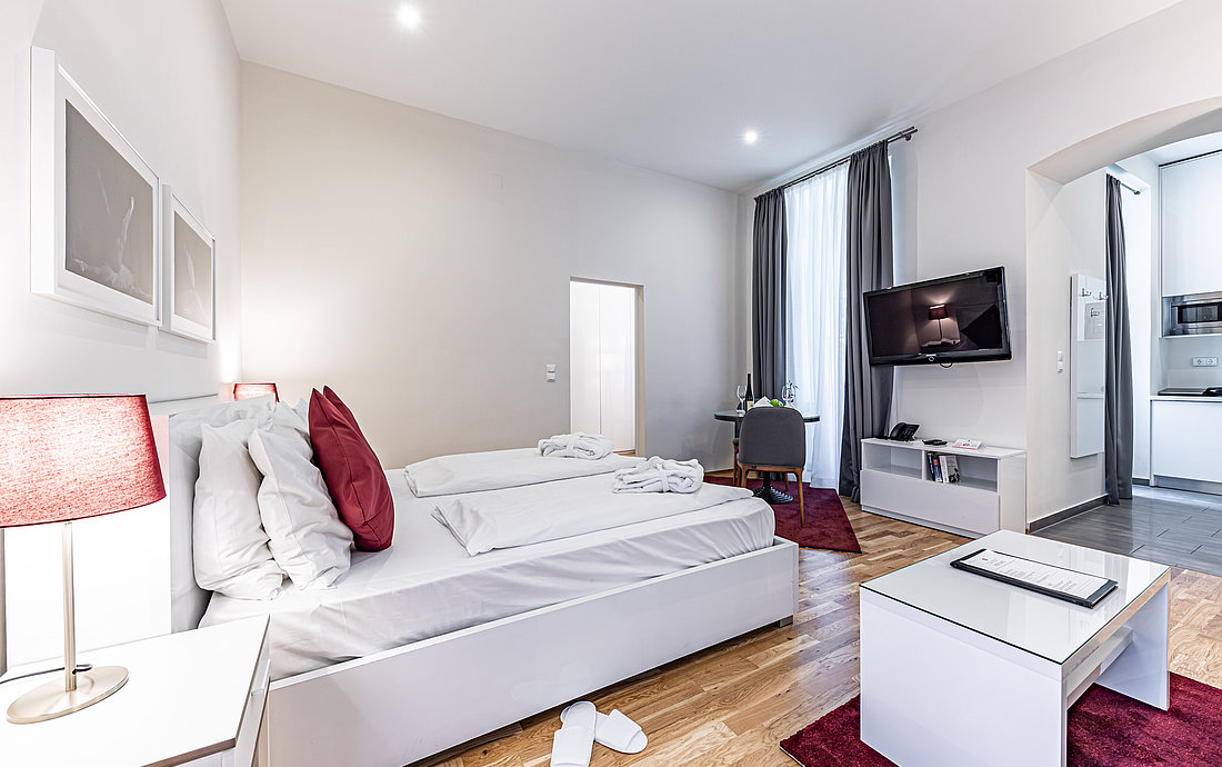 Schlafzimmer im Family Superior Apartment